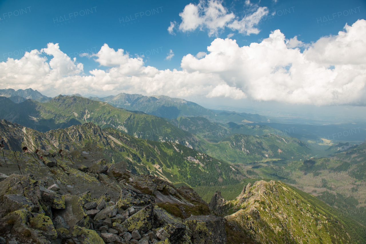 Scenery of high green mountains, blue sky with clouds. High Tatras Slovakia. Beautiful mountain landscape.