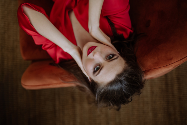 Top view of an young woman with evening make-up.