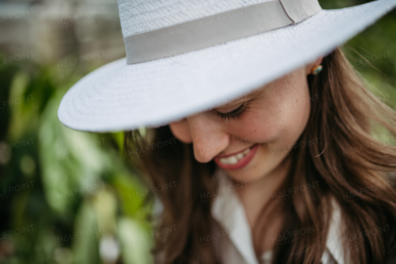 Portrait of a young woman in jungle.