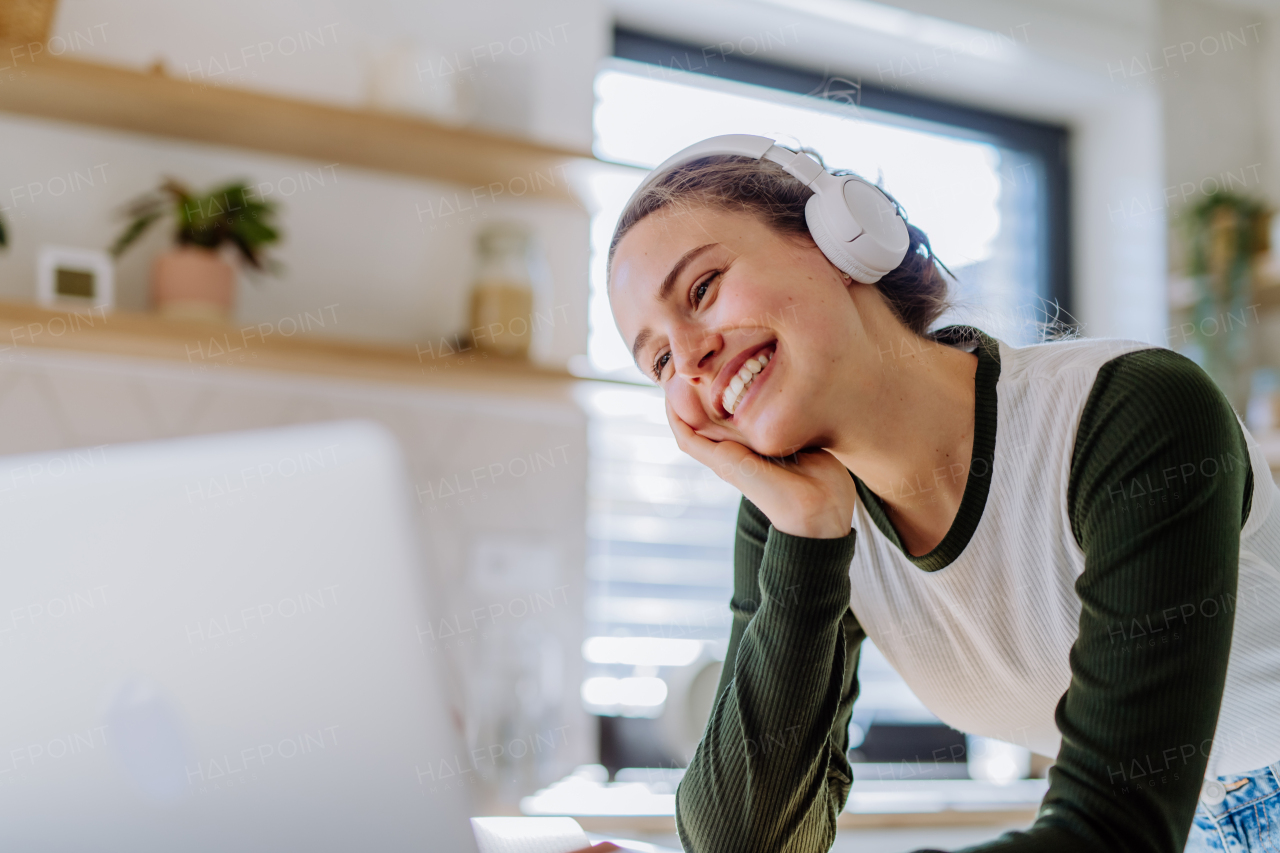 Young woman having homeoffice in an apartment.