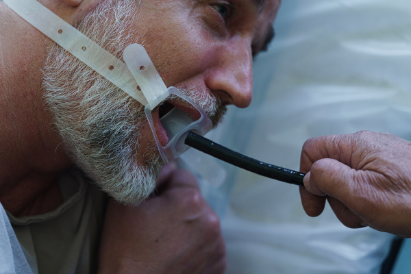 Gastroscopy procedure on sedated patient to examine upper digestive tract. Medical procedure.
