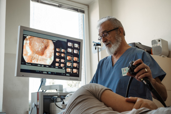 Gastroscopy procedure on sedated patient to examine upper digestive tract. Medical procedure.