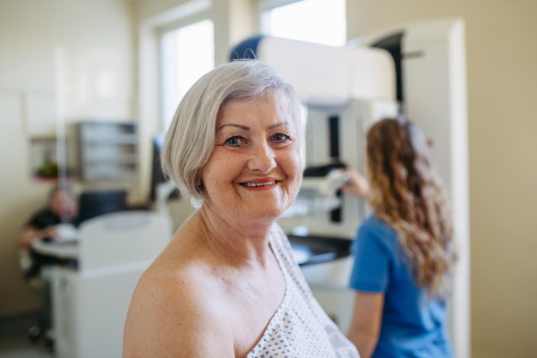 Elderly woman undergoing mammogram during annual preventive checkup