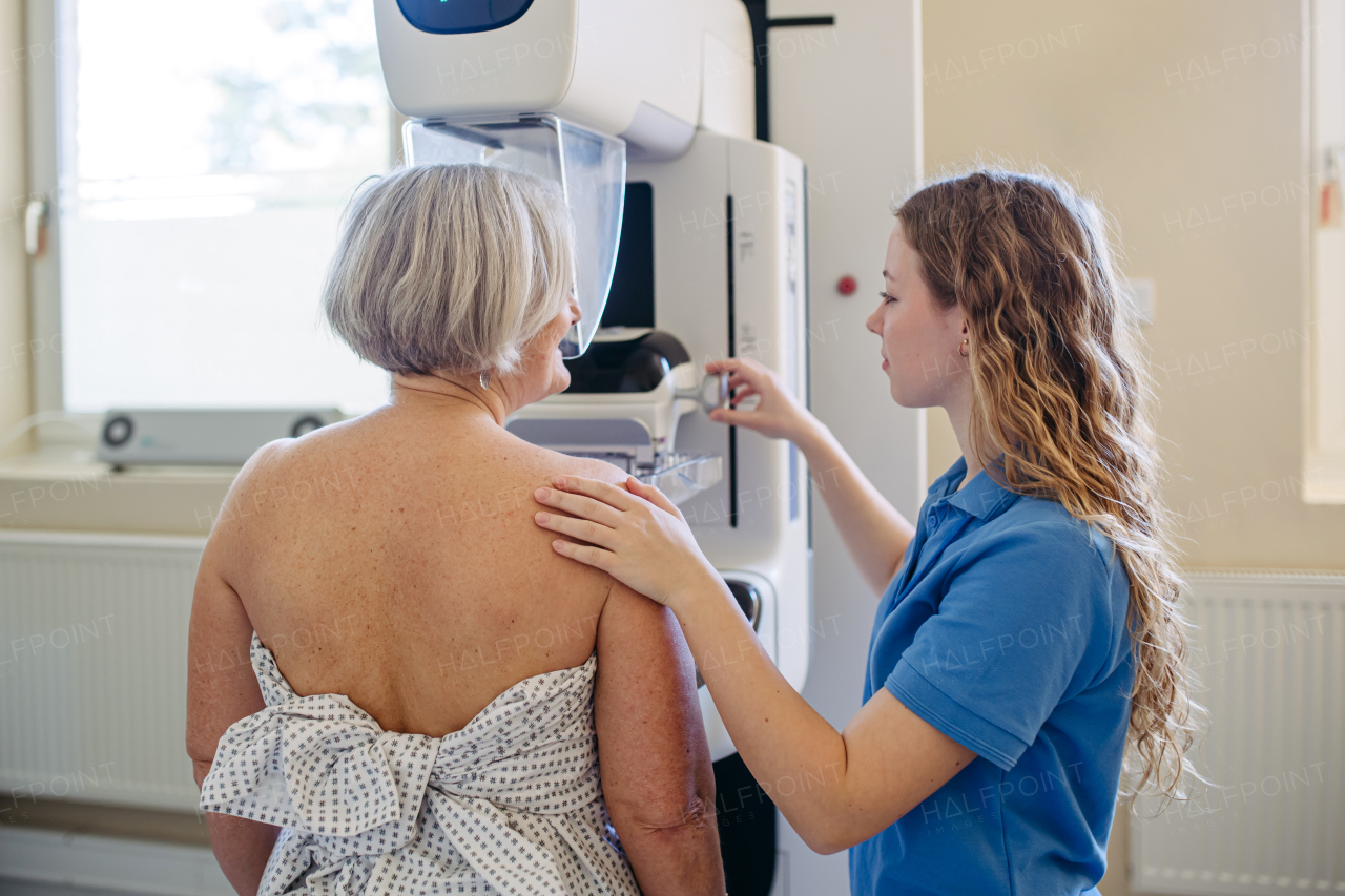 Elderly woman undergoing mammogram during annual preventive checkup