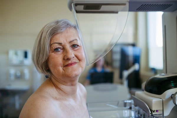 Elderly woman undergoing mammogram during annual preventive checkup