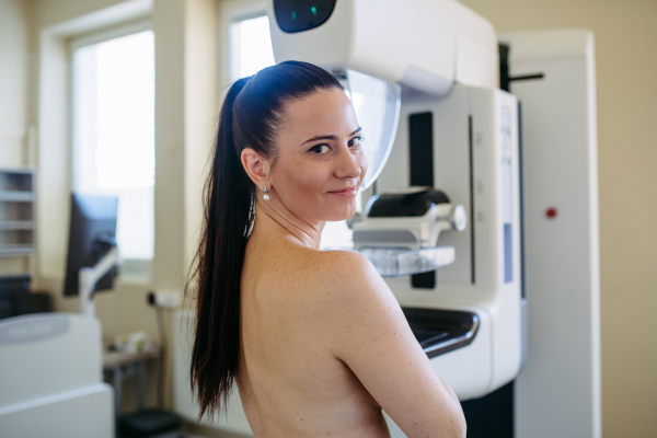 Female patient getting ready for mammography check