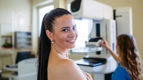 Female patient getting ready for mammography check