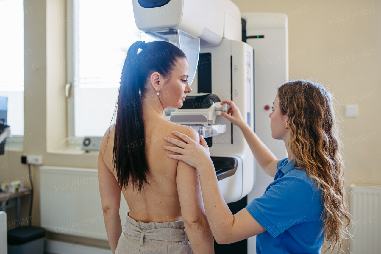 Female patient getting ready for mammography check