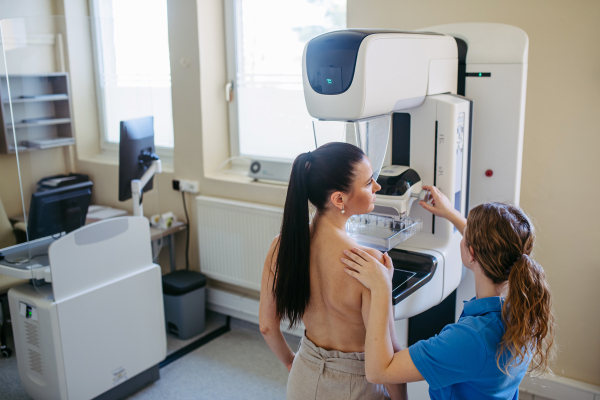 Female patient getting ready for mammography check