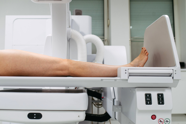 Close up of legs of female patient prepared for diagnostic procedure