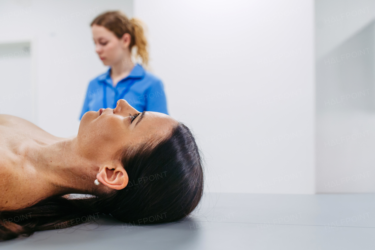 Female patient prepared for diagnostic procedure