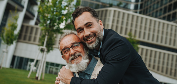 Portrait of handsome mature man and his older father Fathers day concept. Banner.