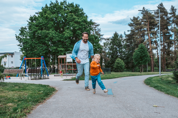 Portrait of dad and child enjoying time together. Fathers day concept.