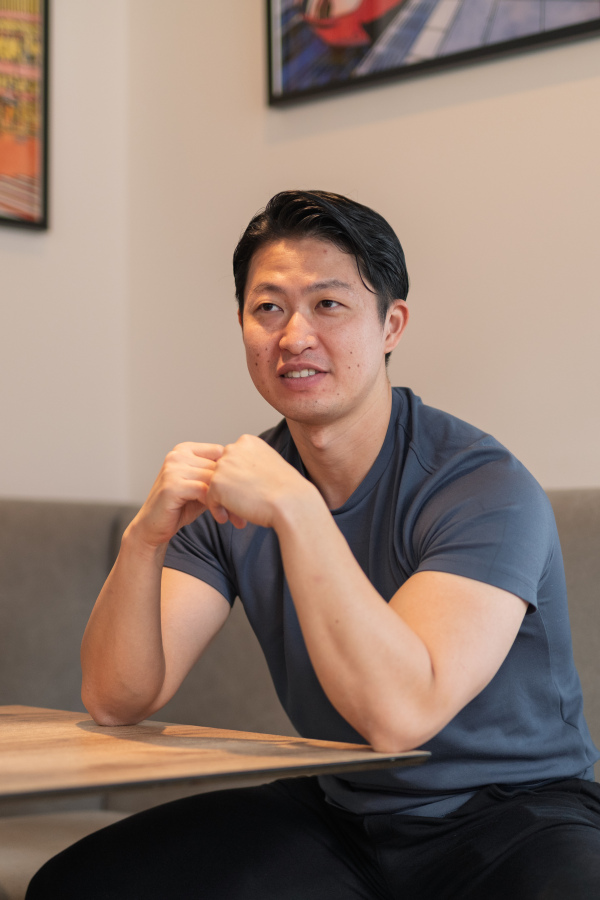 Casual moment of man waiting for food in cafe or restaurant.