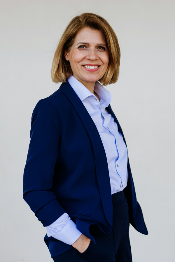 Portrait of beautiful business woman in suit.