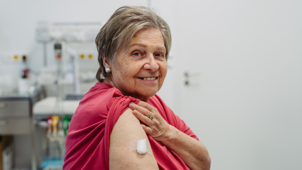 Portrait of lvoely elderly patient after vaccination. Preventive care.