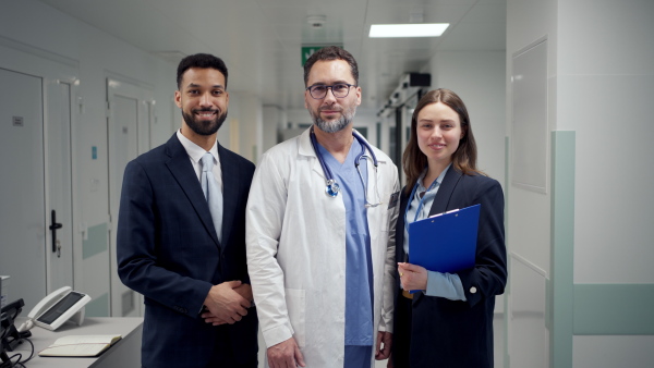 A pharmaceutical sales respresentatives with doctor in hospital.