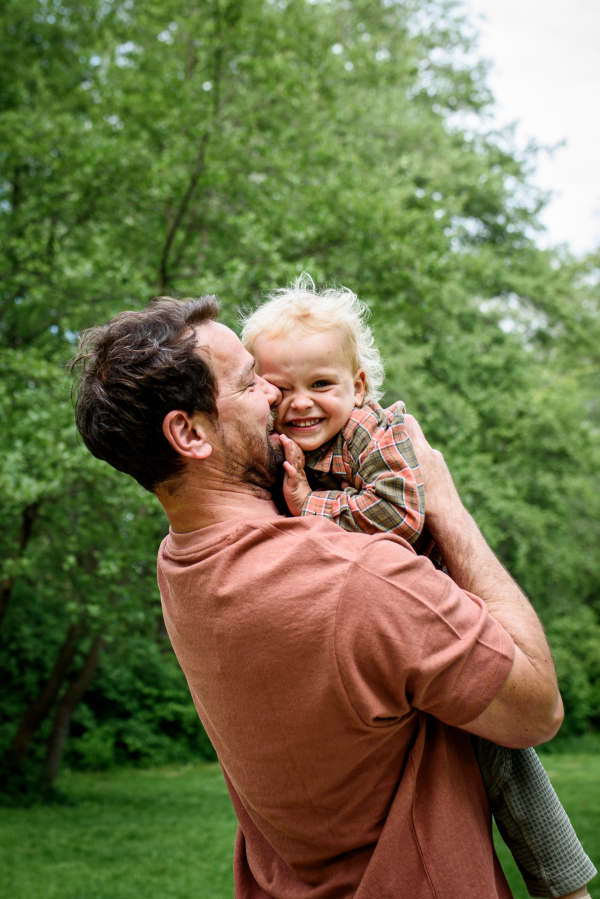 Portrait of dad and child enjoying time together. Fathers day concept.