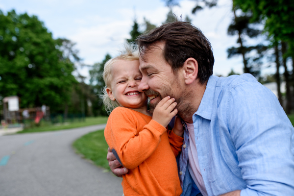 Portrait of dad and child enjoying time together. Fathers day concept.
