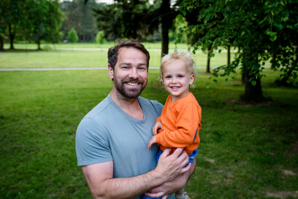 Portrait of dad and child enjoying time together. Fathers day concept.