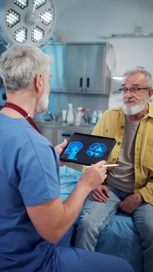 Patient sitting on examination table, describing health problems.